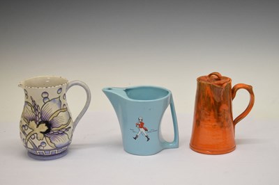 Lot 392 - Three ceramic jugs, to include Barum, Charlotte Rhead, etc