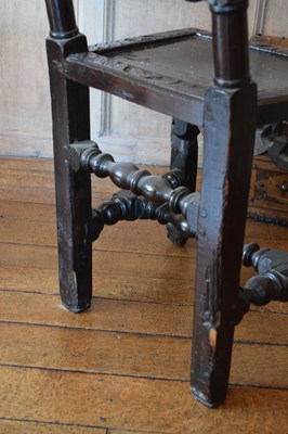 Lot 83 - Pair of late 17th Century carved oak high-back chairs