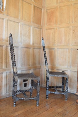 Lot 87 - Pair of late 17th Century stained beech and caned side chairs