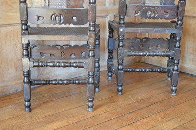 Lot 87 - Pair of late 17th Century stained beech and caned side chairs