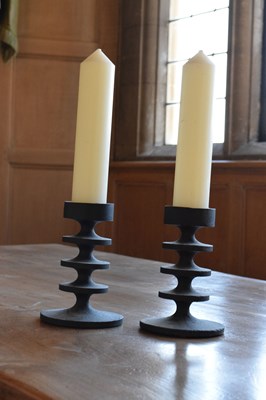Lot 135 - Robert Welch, pair of ‘Hobart’ cast iron candlesticks