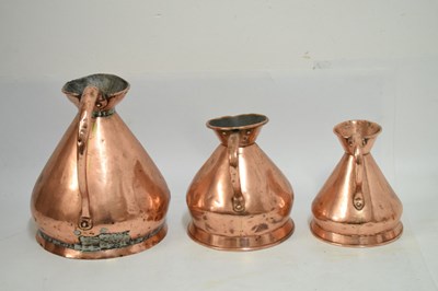Lot 433 - Set of copper jugs