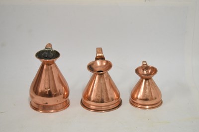 Lot 433 - Set of copper jugs