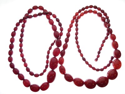 Lot 90 - Two cherry amber necklaces