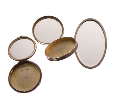 Lot 144 - Two early 20th Century white metal and enamel compacts and mirror