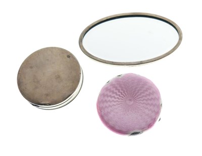 Lot 144 - Two early 20th Century white metal and enamel compacts and mirror