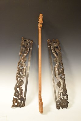 Lot 367 - Three carved wooden Ikat hanging rods