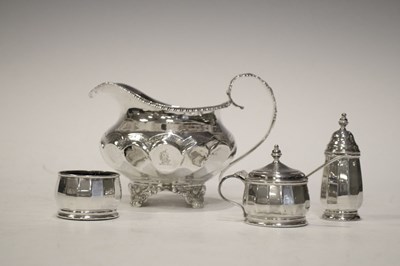 Lot 146 - George IV silver cream jug and a silver three piece condiment set