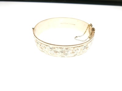 Lot 72 - 1/5th 9ct rolled gold hinged bangle