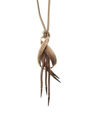 Lot 52 - 9ct gold pendant with tassel drops on a fancy link chain