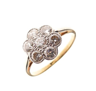 Lot 6 - Seven-stone diamond daisy cluster ring