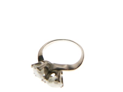 Lot 276 - Two-stone diamond crossover ring