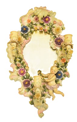 Lot 334 - Porcelain floral encrusted girandole