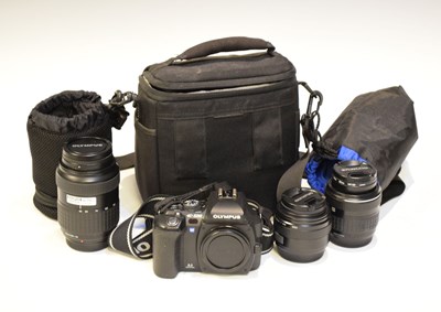 Lot 274 - Olympus E-500 camera and three camera lenses