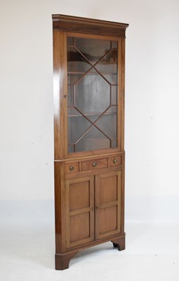 Lot 620 - Late 19th Century mahogany two-section, double corner cupboard