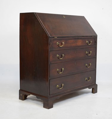 Lot 566 - George III mahogany bureau