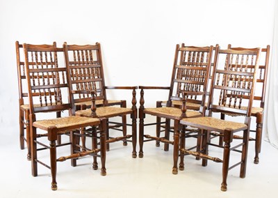 Lot 472 - Set of eight (6 + 2 arm) rush-seated spindle back chairs