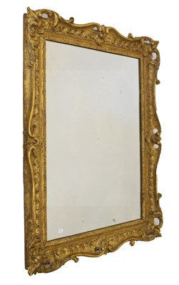 Lot 478 - Giltwood wall mirror, plain plate in swept frame, 84cm wide