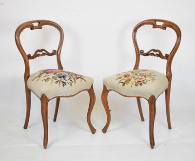 Lot 488 - Pair of Victorian simulated rosewood balloon-back salon chairs