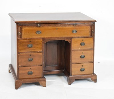 Lot 485 - Edwardian child's kneehole desk with brushing slide, 82.5cm x 42cm x 68cm