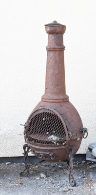 Lot 651 - Cast metal Garden Chimenea on scroll stand