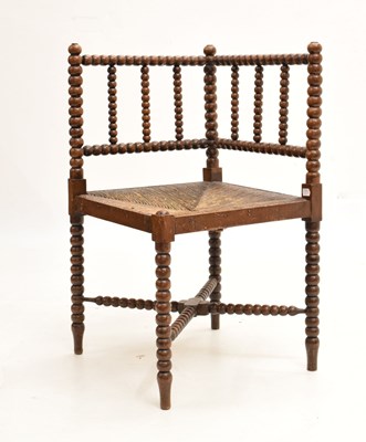 Lot 589 - Morris-style corner chair