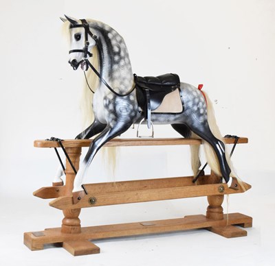 Lot 564 - Stevenson Brothers wooden dapple grey rocking horse
