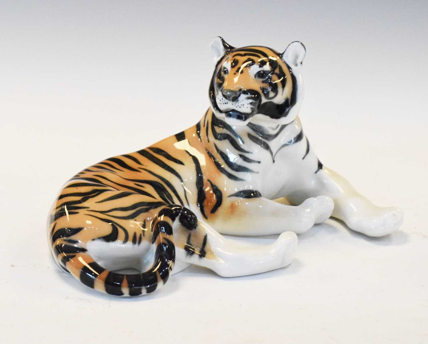 Lot 372 - U.S.S.R porcelain model of a tiger in recumbent pose