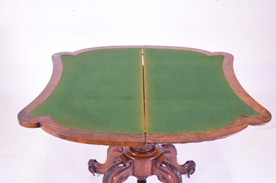 Lot 706 - Victorian figured walnut card table