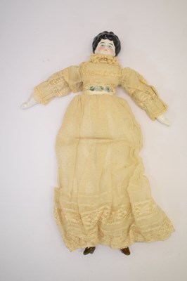 Lot 299 - Porcelain headed doll