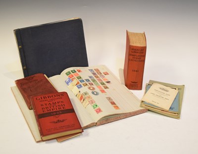 Lot 216 - Two albums of world stamps, together with a small quantity of stamp reference books