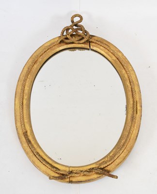 Lot 447 - Oval gilt mirror with rope decoration