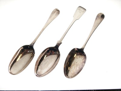 Lot 130 - Two George II silver Hanoverian spoons and a George V fiddle pattern tablespoon