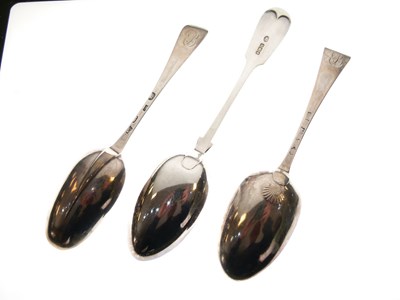 Lot 130 - Two George II silver Hanoverian spoons and a George V fiddle pattern tablespoon