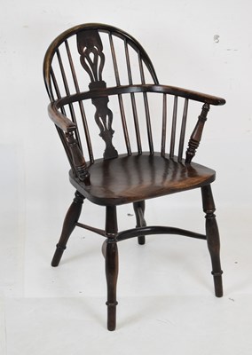 Lot 471 - 19th Century low hoop back Windsor armchair