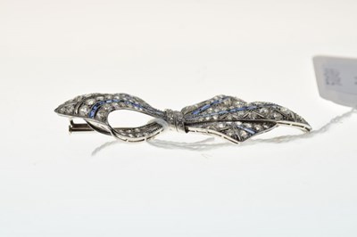 Lot 45 - Diamond and calibré sapphire bow brooch