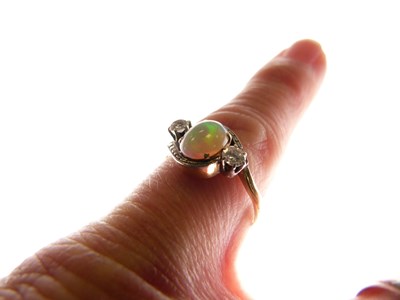Lot 288 - Opal and diamond three-stone ring