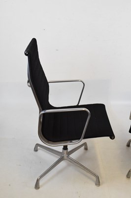 Lot 202 - Charles and Ray Eames - Pair of  swivel armchairs