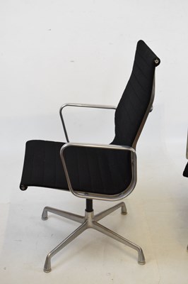 Lot 202 - Charles and Ray Eames - Pair of  swivel armchairs