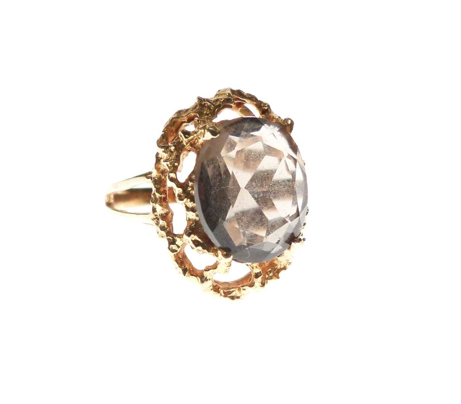 Lot 21 - '18K' yellow metal and brown topaz ring