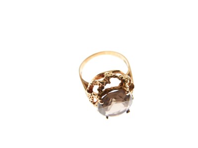 Lot 21 - '18K' yellow metal and brown topaz ring