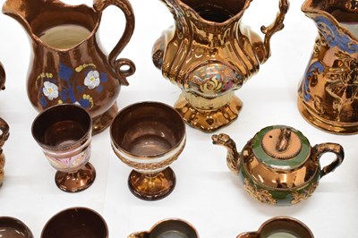Lot 397 - Extensive collection of copper lustre pottery