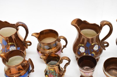 Lot 397 - Extensive collection of copper lustre pottery