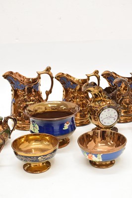 Lot 397 - Extensive collection of copper lustre pottery