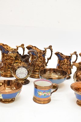 Lot 397 - Extensive collection of copper lustre pottery