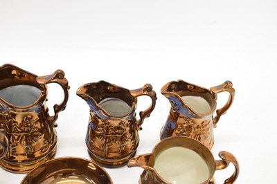 Lot 397 - Extensive collection of copper lustre pottery