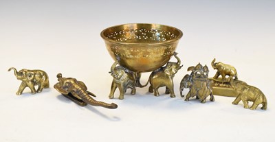 Lot 436 - Indian brass bowl with three elephant supports, plus elephant ornaments (6)