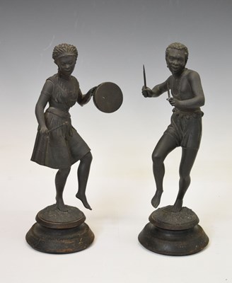 Lot 240 - Pair of spelter figures of African tribespeople dancing