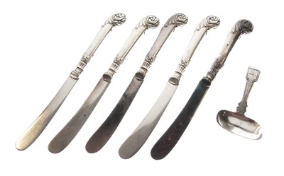 Lot 121 - George IV silver caddy spoons and five later butter knives