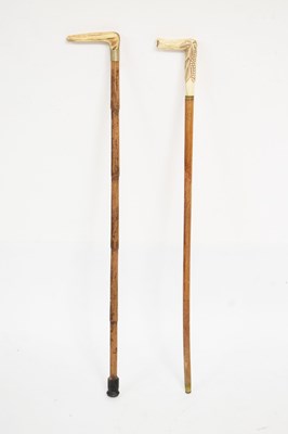 Lot 224 - Bone-handled walking cane and stag antler example